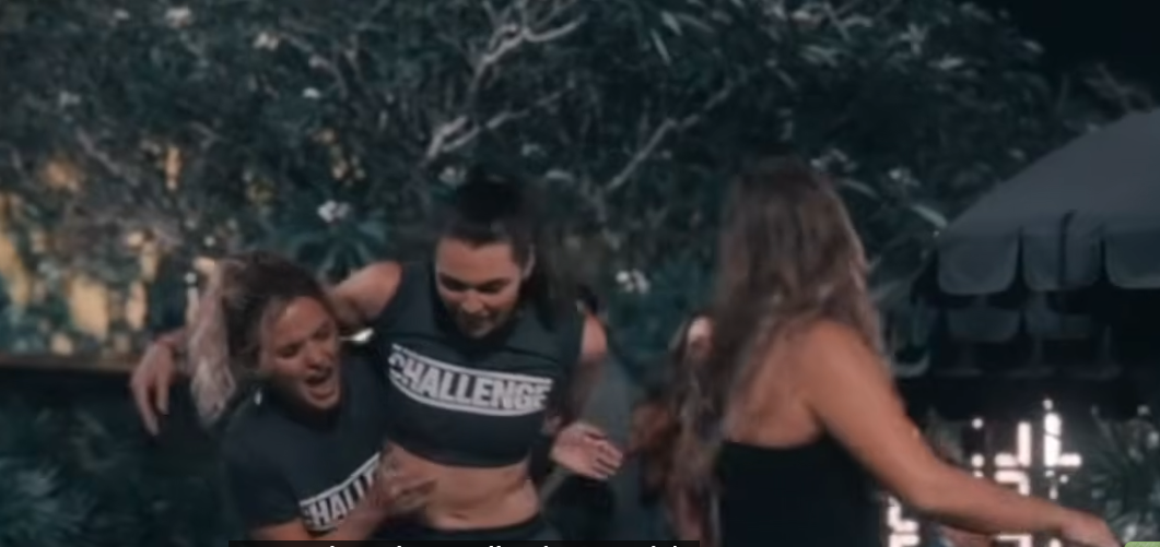 Alexis Lete celebrating with a teammate on The Challenge: Cutthroat